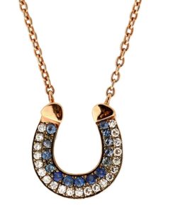 Selim Mouzannar's sapphire ad diamond horseshoe pendant